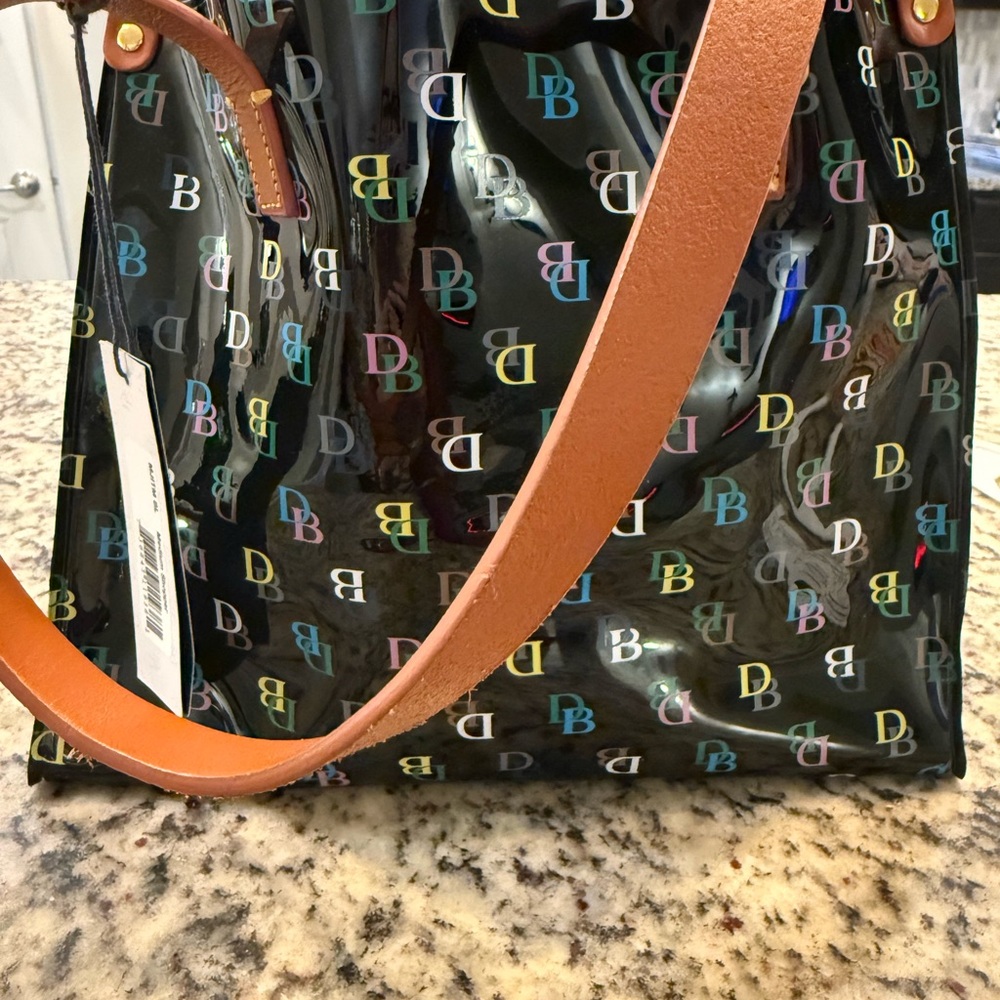 VTG Dooney & Bourke Black Tote with Multicolor Logo and leather strap